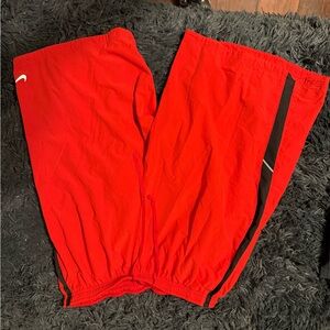Nike Red Athletic shorts with Black Stripe